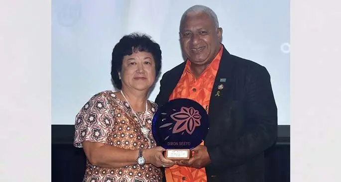 Jenny Seeto and Prime Minister Voreqe Bainimarama.