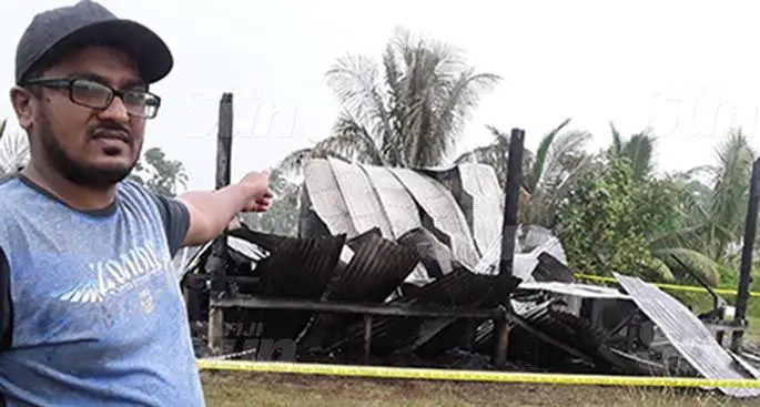 Rajneel Deo in front of the three bedroom house that burned at Veisama in Nausori on March 14, 2021. Photo: Wati Talebula-Nuku.