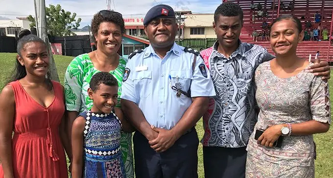 Inspector George Lagi (middle) with his wife Loraini Lagi (second from left) and four children Anaseini Lagi, Ben Lagi, Miri Lagi and Merani Lagi after the Police medal presentation at Subrail Park in Labasa on July 22, 2020.  Photo: Shratika Naidu 