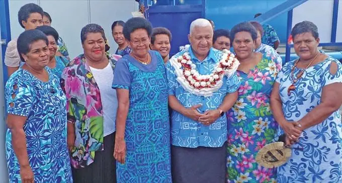 From (R) Prime Minister Voreqe Bainimarama. (L) National Federation Party leader Biman  Prasad.
