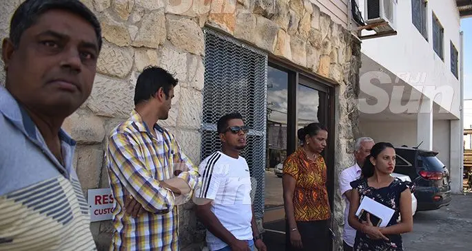 The group of individuals waiting outside the Go Local Holidays Office in Martintar, Nadi, for a response on their visas and purchased airline tickets. Photo: Nicolette Chambers
