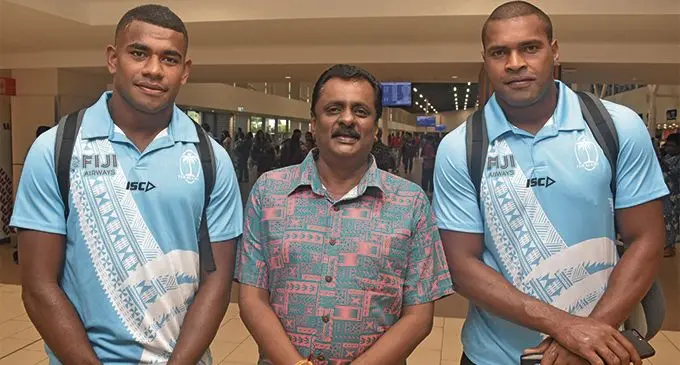 From left: Fiji Airways Fijian 7s rep Apenisa Cakaubalavu, Minister for Youth and Sports Praveen Bala and Josua Vakurinabili at the Nadi International Airport on March 28, 2019. Photo: Waisea Nasokia