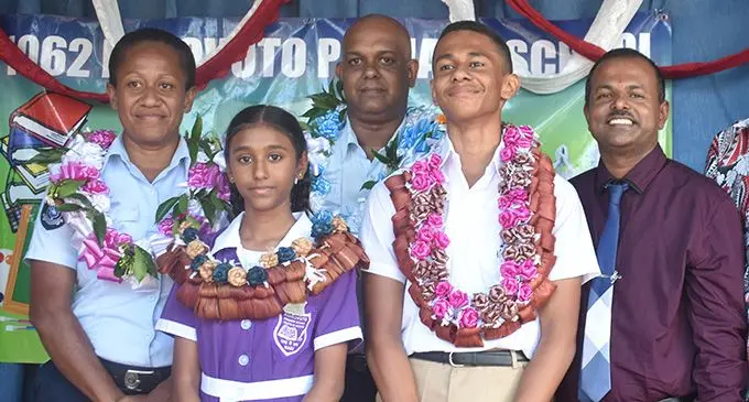 Corporal Mereani Muavesi, head girl Raisha Prasad, Corporal Jainesh Prasad, head boy Tito Zion Muavesi and head teacher Annal Kumar. Photo: Waisea Nasokia