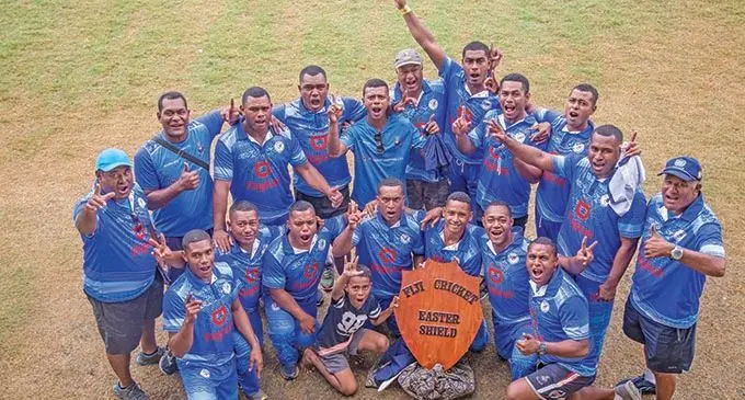 Digicel Suva Warriors players and officials celebrate their win at Albert Park, Suva on April 9, 2021 . Photo: Leon Lord  