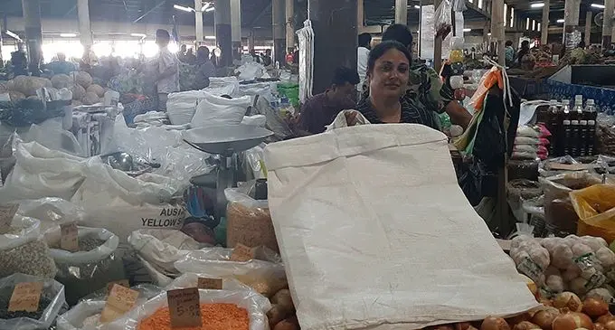 Mahrul Nisha showcases the reusable shopping bags sold by her family’s stall in the Lautoka Market on November 8, 2019. Photo: Salote Qalubau 