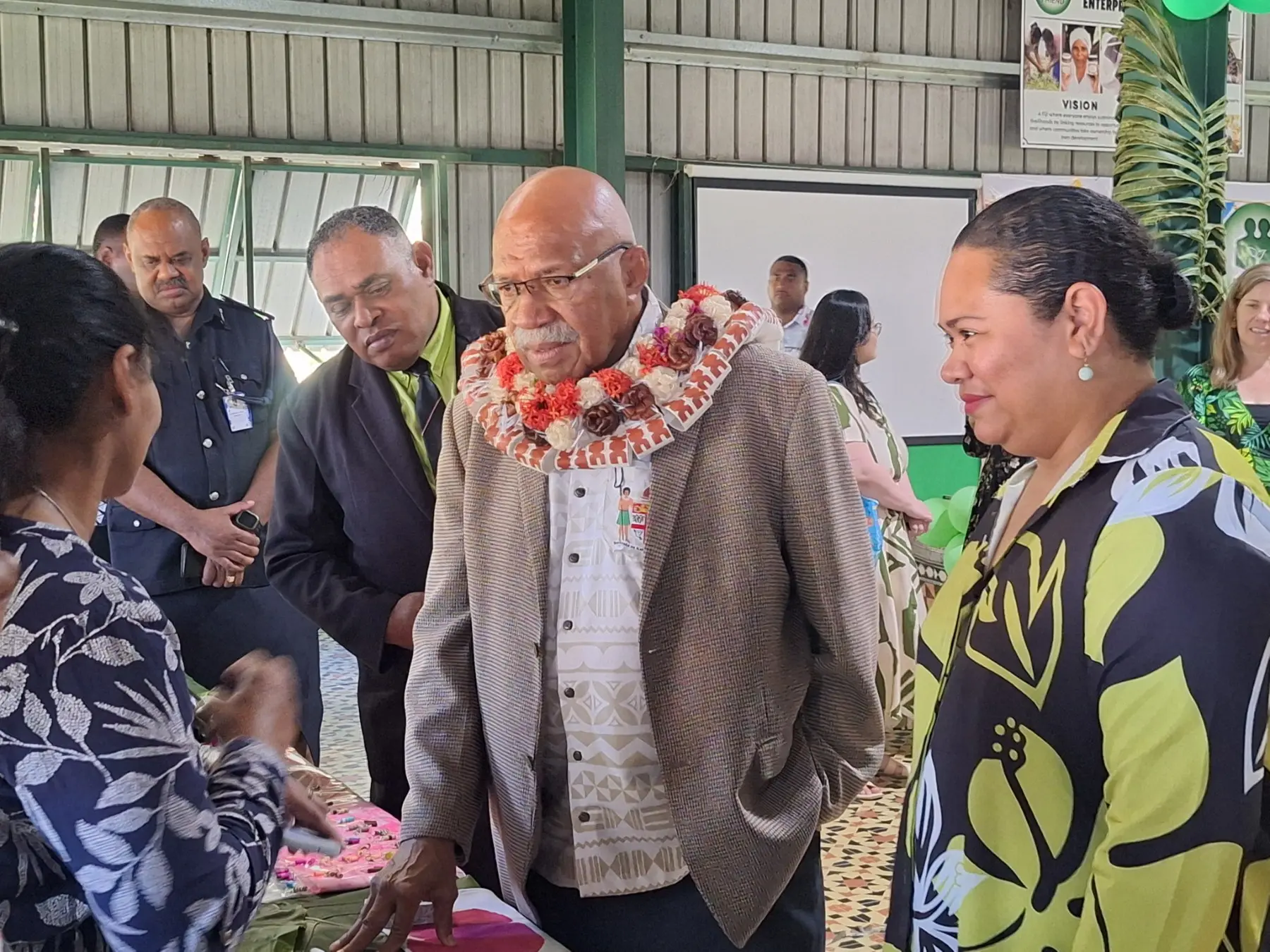 Prime Minister Sitiveni Rabuka (in garland) meets community members at the Foundation for Rural Integrated Enterprises and Development (FRIEND) Fiji’s 25th anniversary celebration at its headquarters in Tuvu, Lautoka, on August 29. 