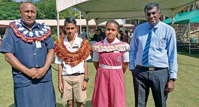 From left: Nadi Police Officer in Charge, Saerupepeli Nakita,  head boy Lawrence Binal Sen, head girl Ane Taupale and Head Teacher, Dharmendra Reddy at the Andrews Primary School in Nadi.  Photo: Mereleki Nai