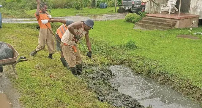 Nausori Town Council workers cleaning the blocked drain last week.