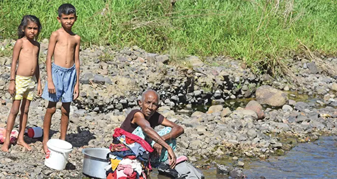 Kamla Wati with her grandchildren Shayna Devi (left) and Shana Prasad at Dreketi Lailai River on March 20, 2020. Photo: Laisa Lui