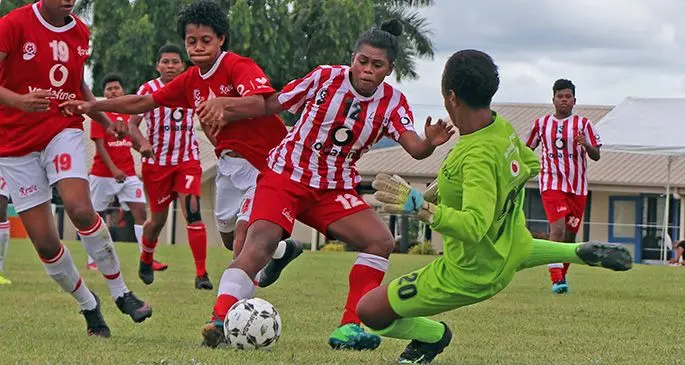 Labasa’s Asenaca Diranuve on attack against Rewa’s goalkeeper Merevesi Fuga.