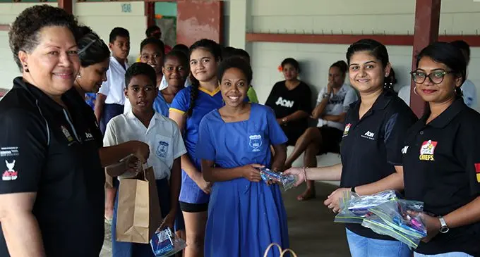 Management and staff of Aon (Fiji) Pte Limited with teachers and students of John Wesley Primary School during the lunch and stationery drive at the school on July 24, 2020. Photo: Inoke Rabonu