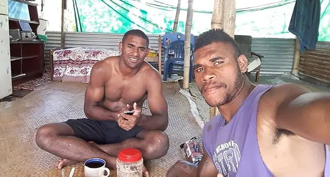 Epeli Momo (left) with his uncle Akuila Tuivuna during breakfast at Korobebe Village in Nadi on May 17, 2020. 
