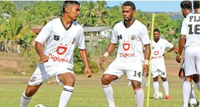 National football training squad members Afraz Ali (left) and Dave Radrigai during a their training session at the Fiji Football Academy in Ba on December 2021. The training squad march into camp today before they fly out to Melbourne early next month. Photo: Fiji FA
