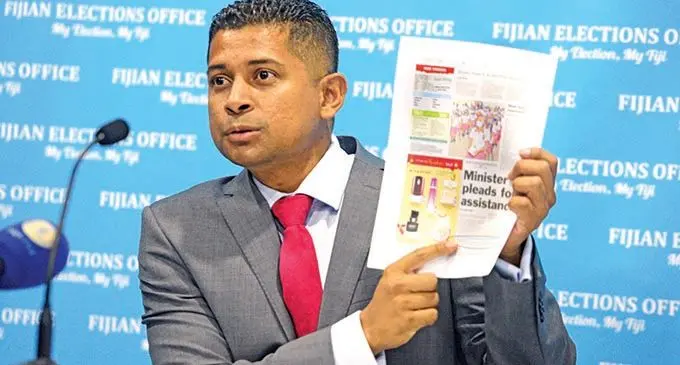 Fijian Elections office Supervisor of Elections, Mohammed Saneem questions a Fiji Times news article during a press conference on December 14, 2021.  Photo: Ronald Kumar