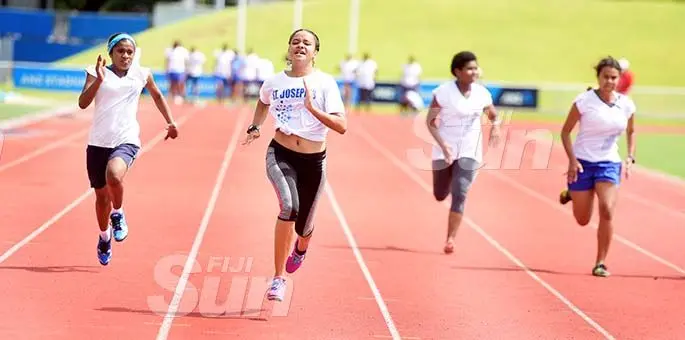 Jada Varatamana (second from left) won the junior-girls 100meters heats during St Joseph Secondary School trails at ANZ Stadium on February 8, 2020. Photo: Ronald Kumar.