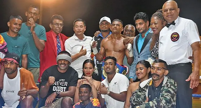 WBF Australasian featherweight champion Junior Binnu Singh (wearing belt) celebrates with family and friends at Lawaqa Park, Sigatoka on August 31, 2024. Photo: Waisea Nasokia