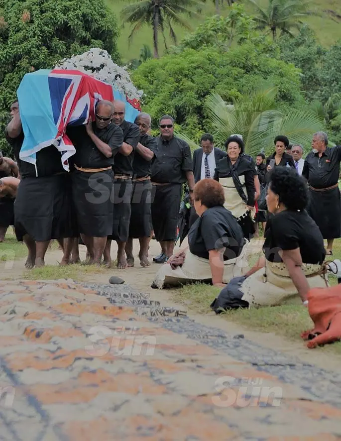 Pallbearers carry the casket of the late former prime minister into his home 'Naivaka'. Photo: Inoke Rabonu
