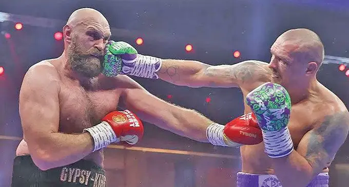 Oleksandr Usyk (right) beat Tyson Fury to retain the unified WBA (World Boxing Association), WBC (World Boxing Council) and WBO (World Boxing Organisation) world heavyweight titles at the Kingdom Arena in Riyadh, Saudi Arabia on December 22, 2024. Photo: Sky Sports