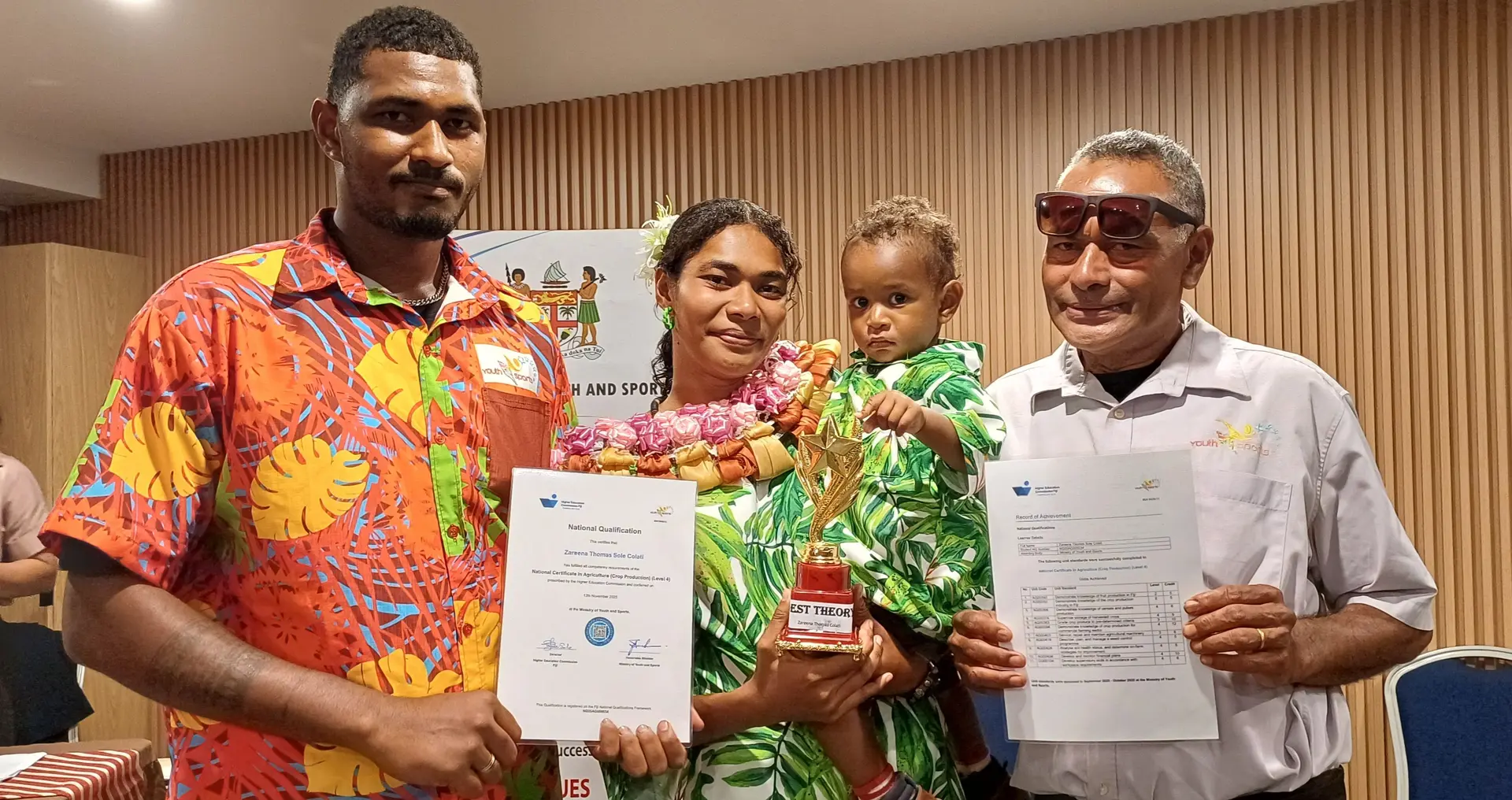 Zareena Thomas Colati holding her son, Edward Colati while standing with her father, Etuate Colati (right) and brother, Tarogi Colati during the graduation at Ramada Encore Hotel, Damodar City in Labasa on November 13, 2025.