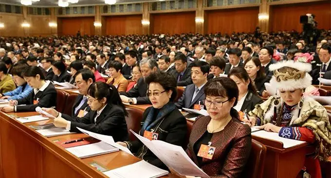 Deputies to the 13th National People’s Congress attend the opening meeting of the first session of the 13th National People’s  Congress at the Great Hall of the People in Beijing, March 5, 2018. Photo: Xu Jingxing/China Daily