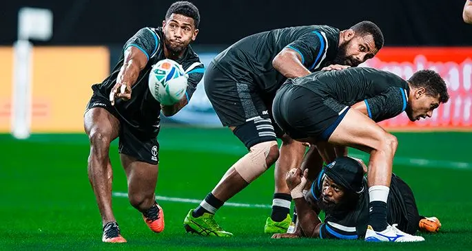 From left: Fiji Airways Flying Fijians reps Frank Lomani, captain Dominiko Waqaniburotu, Ben Volavola and Levani Botia (on the turf) during the captain’s run inside the Sapporo Dome in Japan.  Photo: Bruce Southwick/ZoomFiji