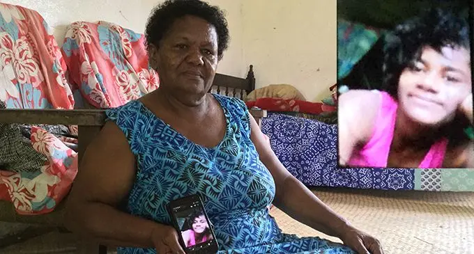 Salote Bolawai, 64, showing a photo of her late  granddaughter, Asinate Vakaloloma at her home in Kalabu.  Photo: Laiseana Nasiga