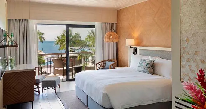 A newly renovated room at Sofitel Fiji Resort and Spa with an outside view.