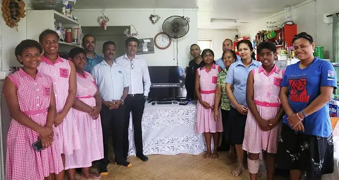 Senior girls of the Harland Hostel’s Gospel School of the Deaf in Samabula pictured with Credit Corporation Limited representatives.