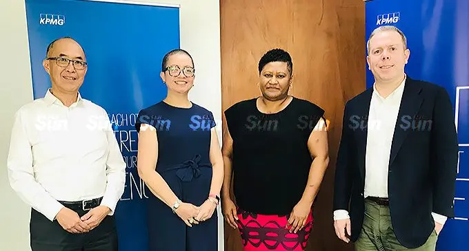 From left: KPMG Fiji Partner, Audit and Assurance, Michael Yee Joy, KPMG Fiji Partner, Tax, Transactions and Accounting, Lisa Apted, KPMG Fiji Director, Meliki Tuinamuana and KPMG National Managing Partner, Paul Howes, after the announcements at the KPMG Fiji office on May 31,2022. Photo: Laisa Lui