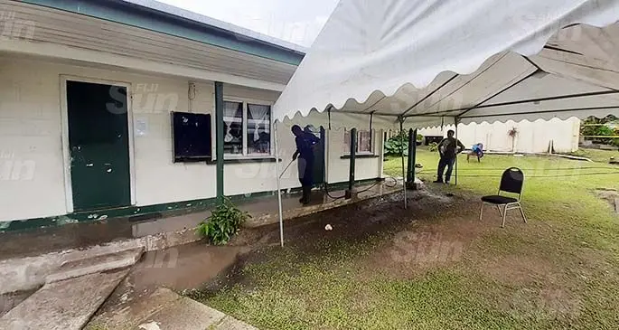 Staff members of Suva Forklift Hire cleaning the Samabula Health centre. Photo: Shalveen Chand