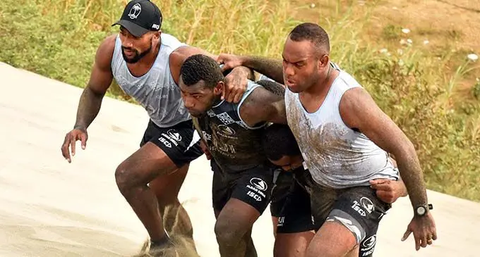 Asaeli Tuivuaka (middle) with Fijian Drua team-mates Jona Sawailau (left) and Eremasi Radrodro during their training at the Sigatoke sand dunes in 2018. On page 47, Tuivuaka tells why he changed his mind to take up an overseas offer instead of playing for the Drua in the Super Rugby Pacific. 