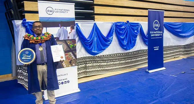 Fiji National University (FNU) gold medalist Bryce Rajat Raj following his Fiji National University graduation ceremony on September 30, 2022