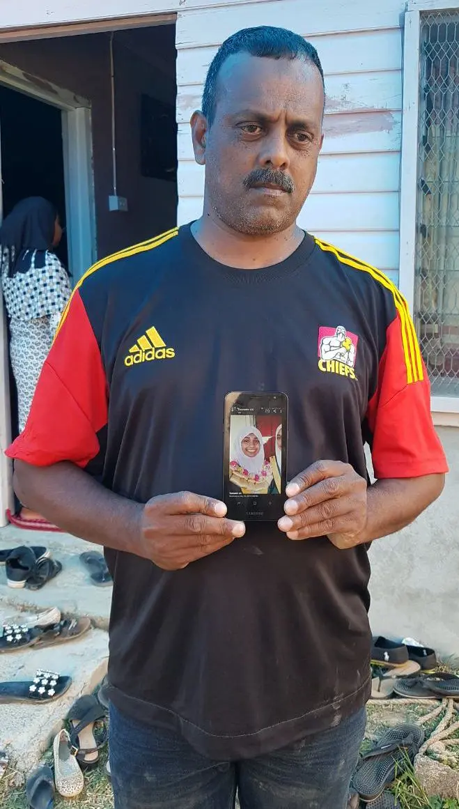 Dad, Mohammad Imraz Sheikh holding the picture of his daughter, Nurainah Sheikh at Mulomulo Settlement in Nadi on May 23, 2019.