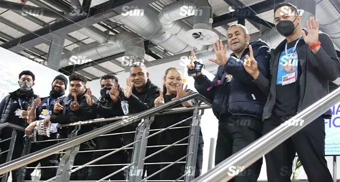 SPREP Director Climate Change Resilience, Tagaloa Cooper-Halo with some of the Fijian fire marshals at the Pacific Pavillion, Scottish Exhibition Campus, in Glasgow, Scotland. Photo: Rosi Doviverata