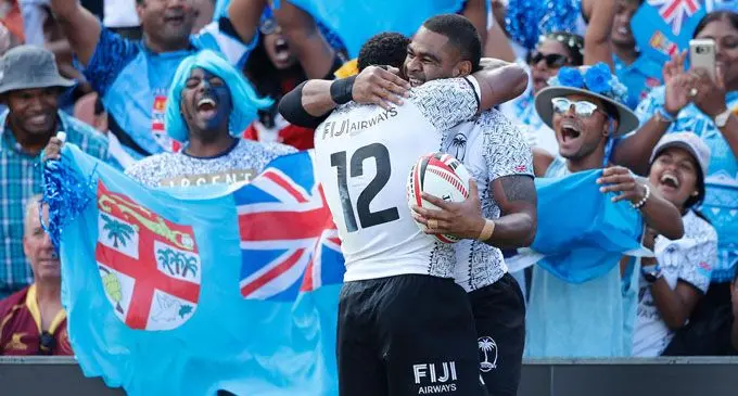 Fiji Airways Fijian 7s reps Vatemo Ravouvou and captain Seremaia Tuwai celebrate after defeating New Zealand in the cup semi final 14-12. Photo:  World Rugby