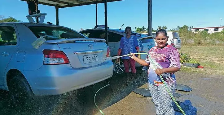 Sangeeta Devi washing cars at their station in Nadi backroad. Photo: Mereleki Nai
