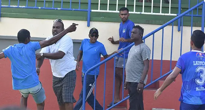 A frustrated Lautoka fan (left) confronts coach Kamal Swamy (right) during the halftime of the Vodafone Premier League clash on February 18, 2018. At this stage Lautoka was behind Suva by 1-0. Photo: Waisea Nasokia