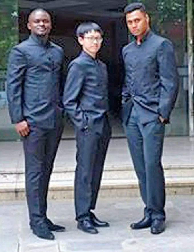 Remo Cevalawa with colleagues in China.  