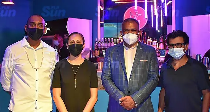 From left: Ron and Kyrie Goundar, Minister for Commerce, Trade, Tourism and Transport Faiyaz Koya and Tappoo Group of Companies executive director Kaushal Tappoo during the launch of Ice Bar & Grill at Martintar in Nadi on December 22, 2021. Photo: Waisea Nasokia