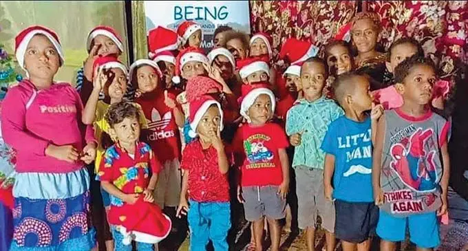 Childrenof Nasinu heart home asisted by Being Helping Hands Fiji celebrating Christmas with joy.