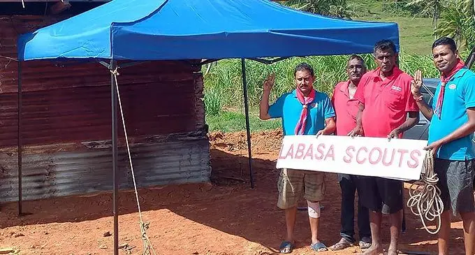 Labasa District Scouters Council members Swatandra Singh (left) with Krishneel Prasad (right) after putting up the tent for Davendra Kumar (second from the right) as he stood with his relative Vijay Kumar in Coqeloa, Labasa on November 8, 2022.
