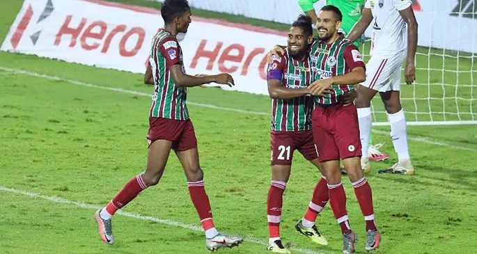 Roy Krishna (left) embraces David Williams for scoring the first goal for ATK Mohun Bagan in the 2-1 win over NorthEast United in the ISL semifinal at the Nehru Stadium in Fatorda on March 9, 2021. Photo: ISL
