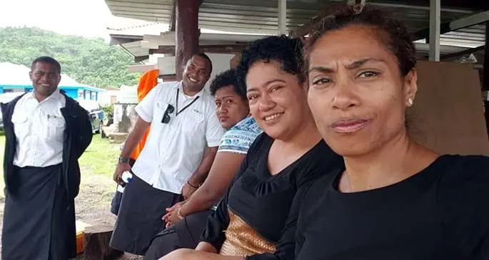 Opposition Whip, Lynda Tabuya (closest to camera) with mourners in Mavana Village, Vanuabalavu, Lau.