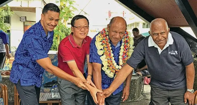 From left: Permanent Secretary for  Fisheries, Pene Baleinabuli,  Managing Director Golden Ocean,  Du Xuejun, Minister for Forestry, Osea Naiqamu and Marika Nasegai from iTaukei Agriculture cutting the cake at  the Ratu Sukuna Park on  November 21, 2020.    Photo: Kelera  Sovasiga