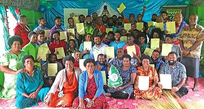 Fiji Mahogany Trust general manager Sakiasi Rokovucago (right) with the participants during the closing of two weeks training at Nayarailagi Village in Cakaudrove on April 1, 2022. Photo: Shratika Naidu.