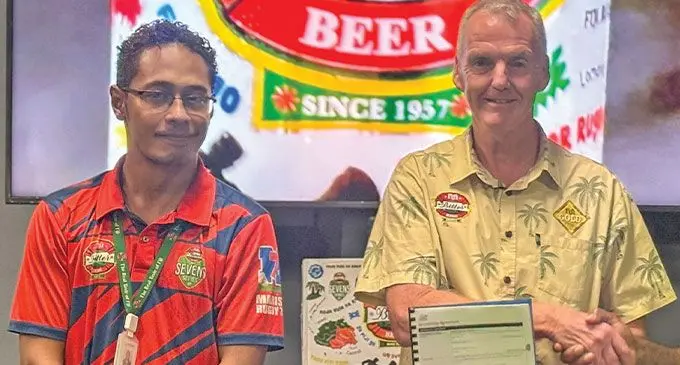 Paradise Beverage sponsorship and events specialist Alfio Tekavei and Paradise Beverages general manager Mike Spencer.