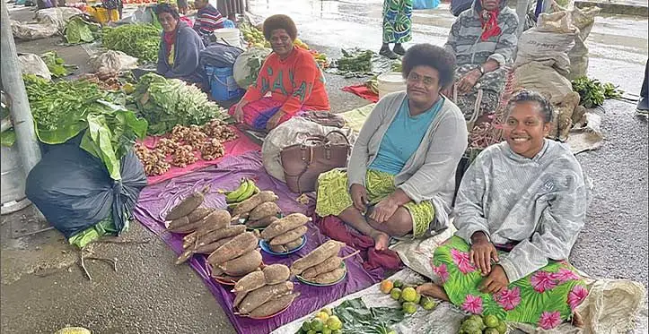 FNU graduate Lili Siliva (right) at the Suva Municipal Market. Photo: Aralai Vosayaco
