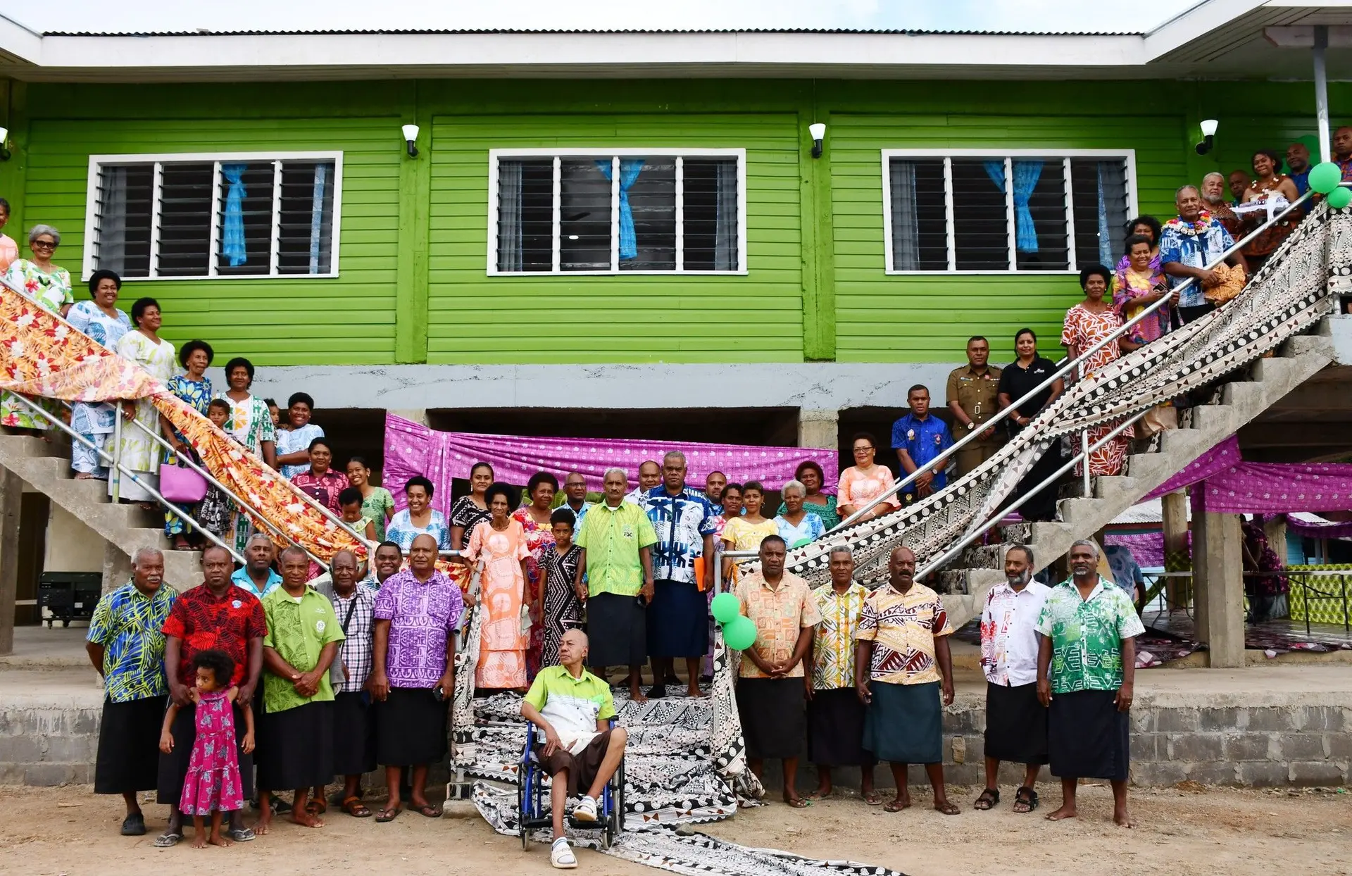 Minister Ditoka with villagers