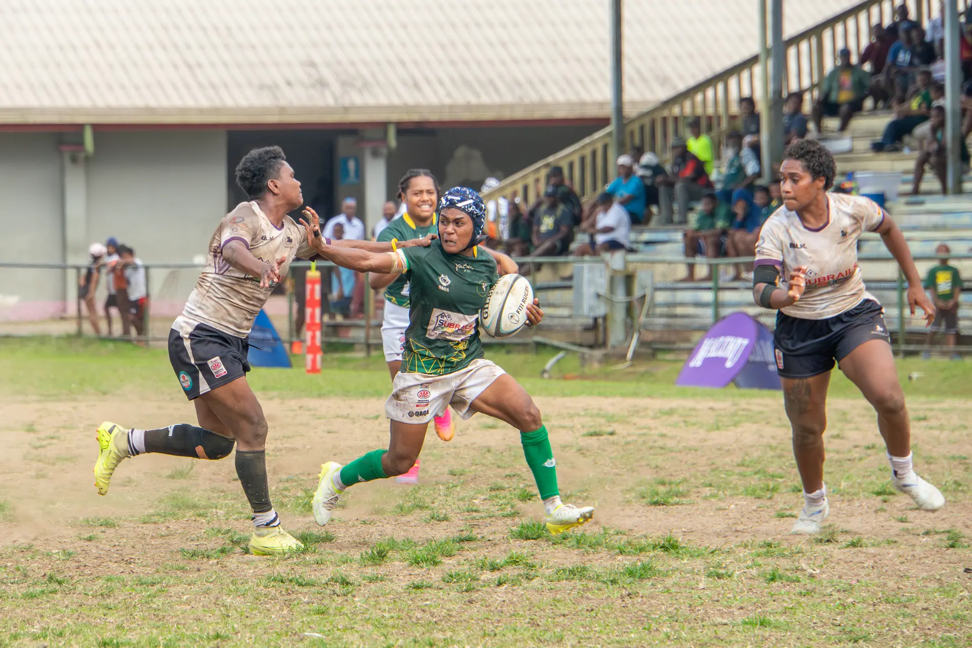 Tailevu halfback Adi Mereani Rogosau fends off Nadroga’s Vika Nakacia