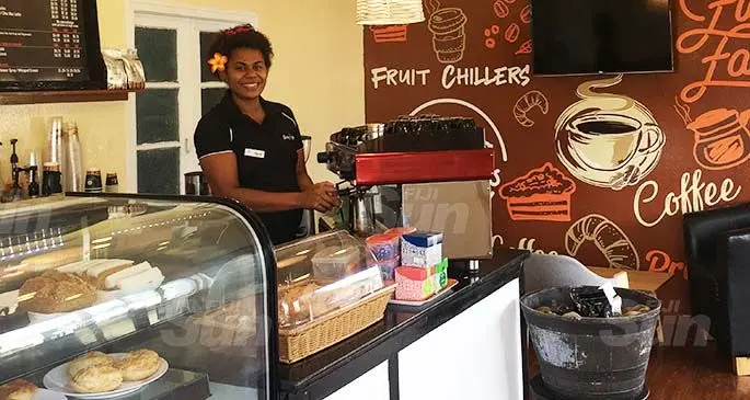 British Deputy High Commissioner to Fiji Paul Welsh (third from left) dropped in at Gloria Jean’s after his morning run yesterday for coffee and croissants, where he was asked by staff for a group photo.